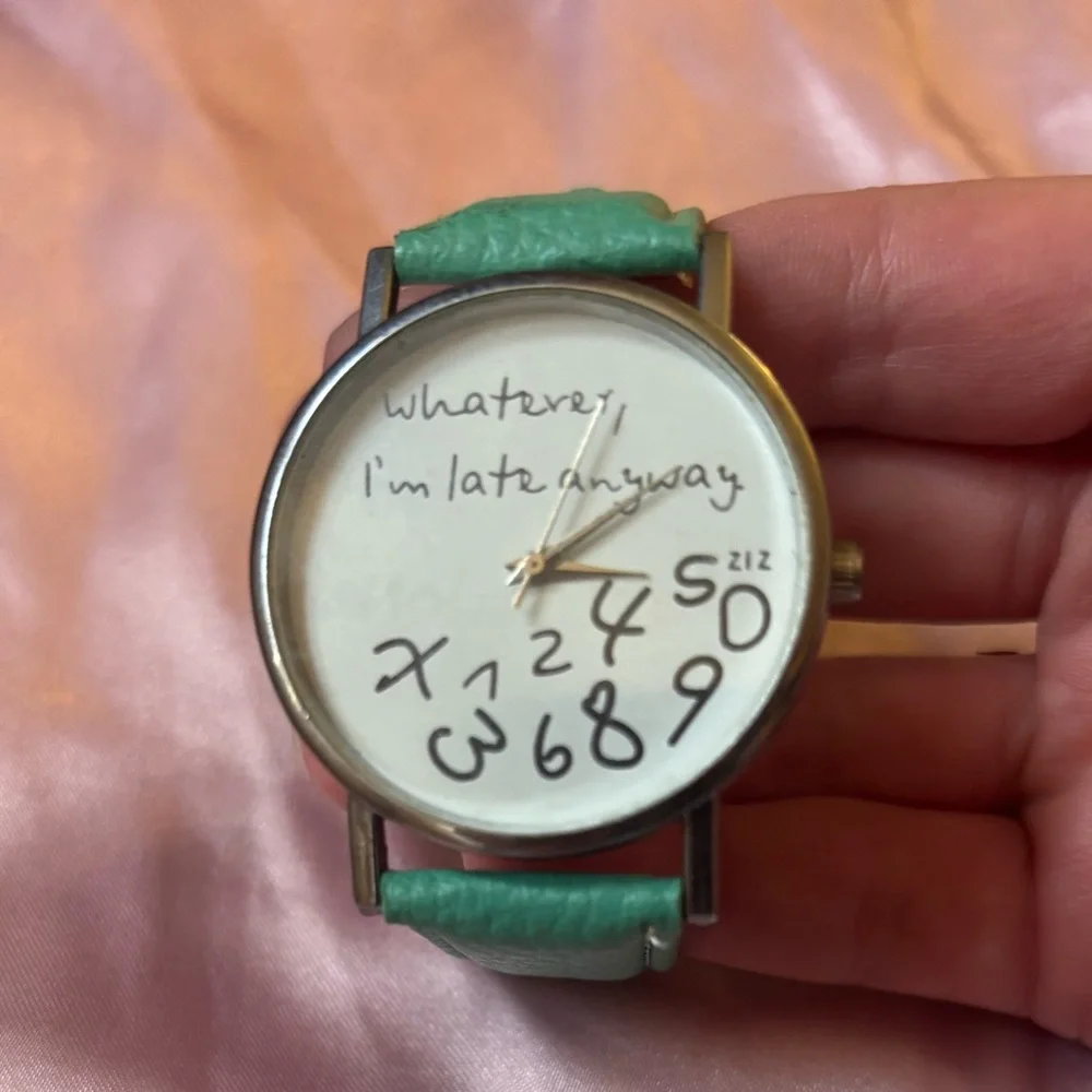 Teal Wristwatch with Quirky Dial